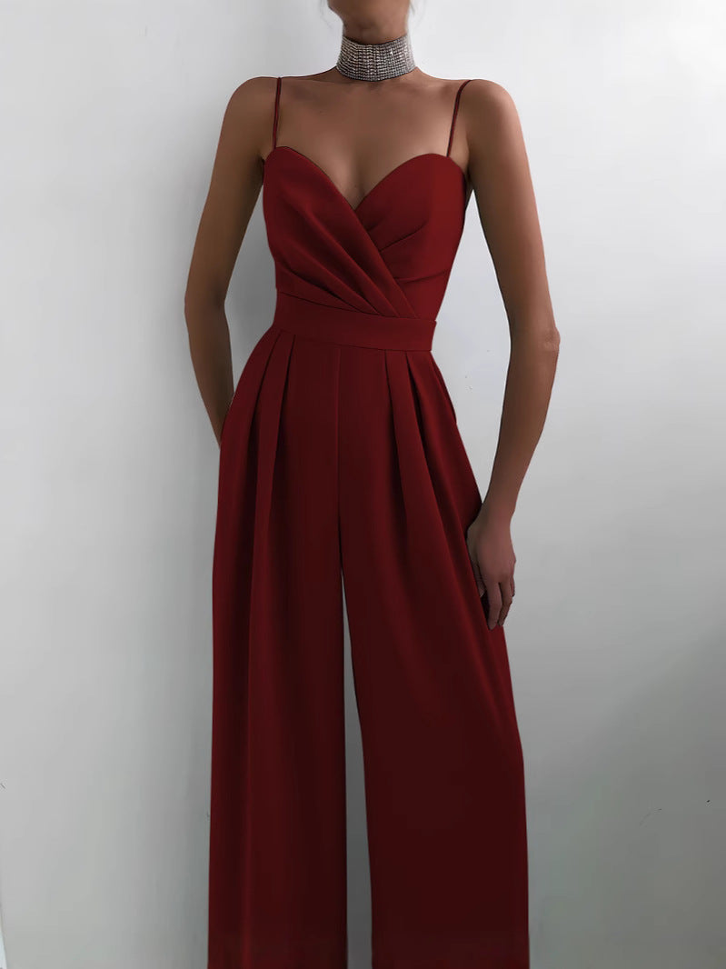 Modny damski kombinezon w jednolitym kolorze z szerokimi nogawkami i szeroką talią, bez rękawów i szelkami